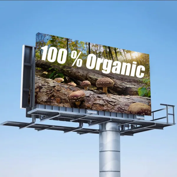 Organic Mushrooms shown on a billboard reading 100% Organic